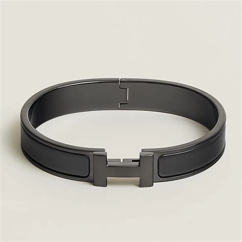 black hermes clip bracelet v black tiffany bracelet|Hermes bracelets for women.